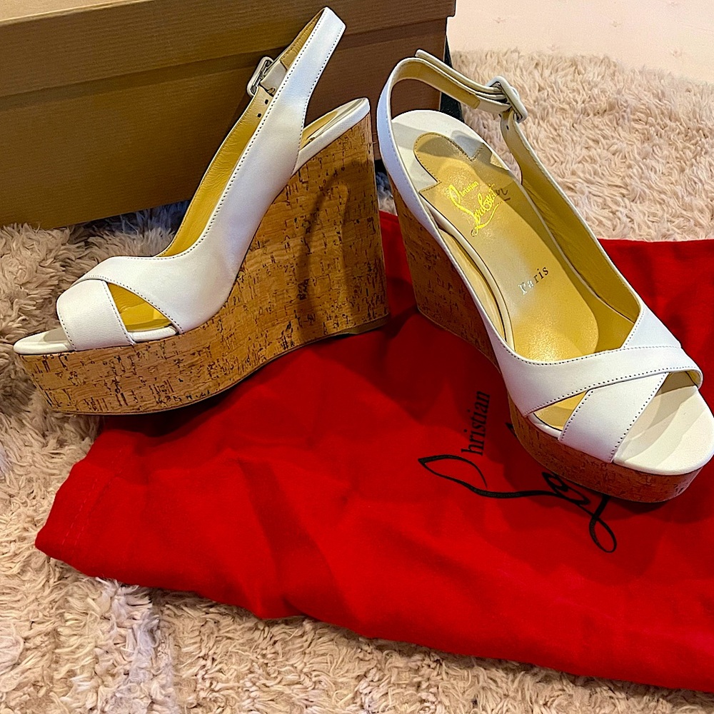 Christian Louboutin white leather wedges!